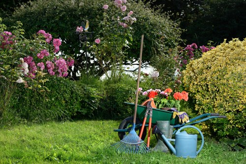 Worker mowing a residential lawn