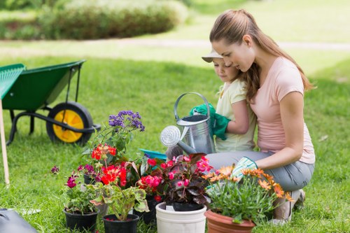 Eltham lawn care team working on a garden